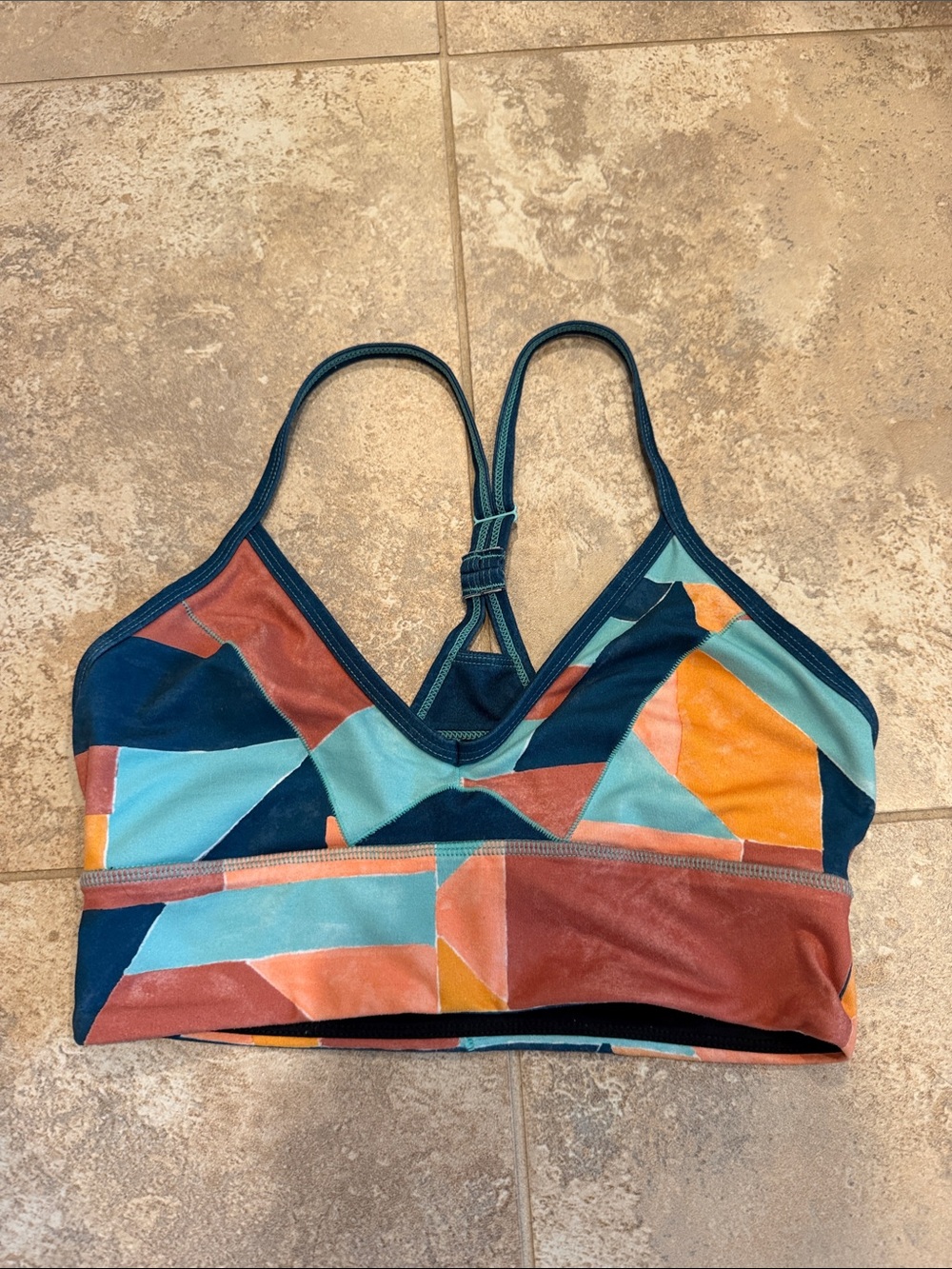 Prana Geometric Colorblock Racerback Bra in Teal, Orange & Rust